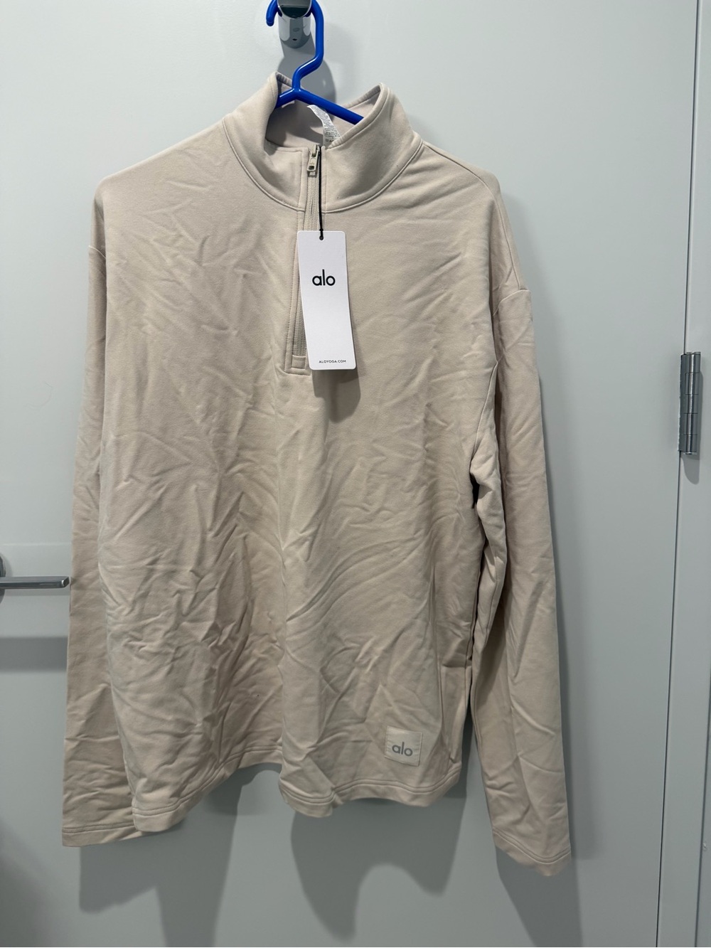 ALO Yoga Men’s Zip-Up Sweater in Light Beige